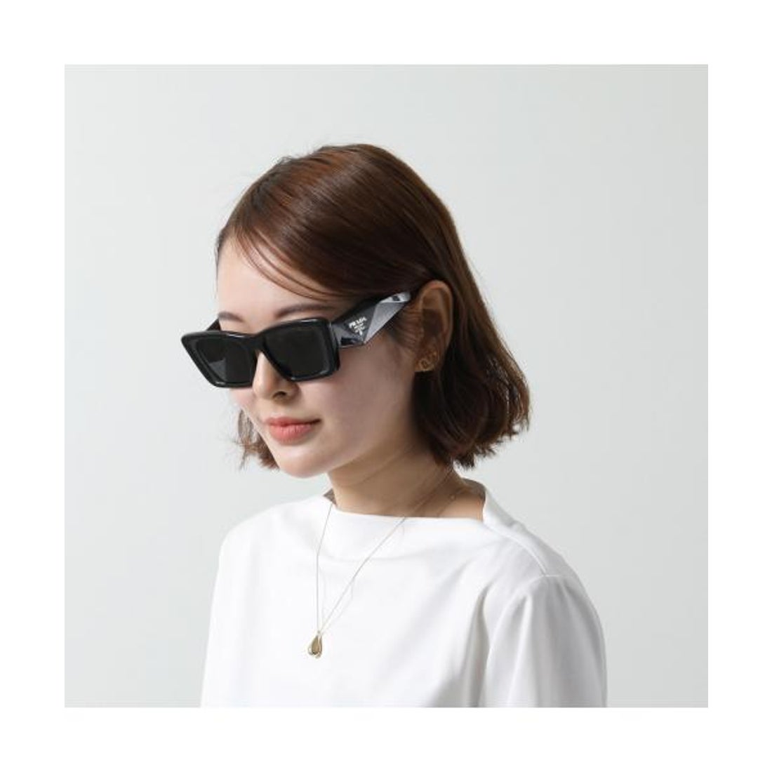 プラダ PRADA PRADA サングラス SPR 08Y キャットアイ型トライアングル