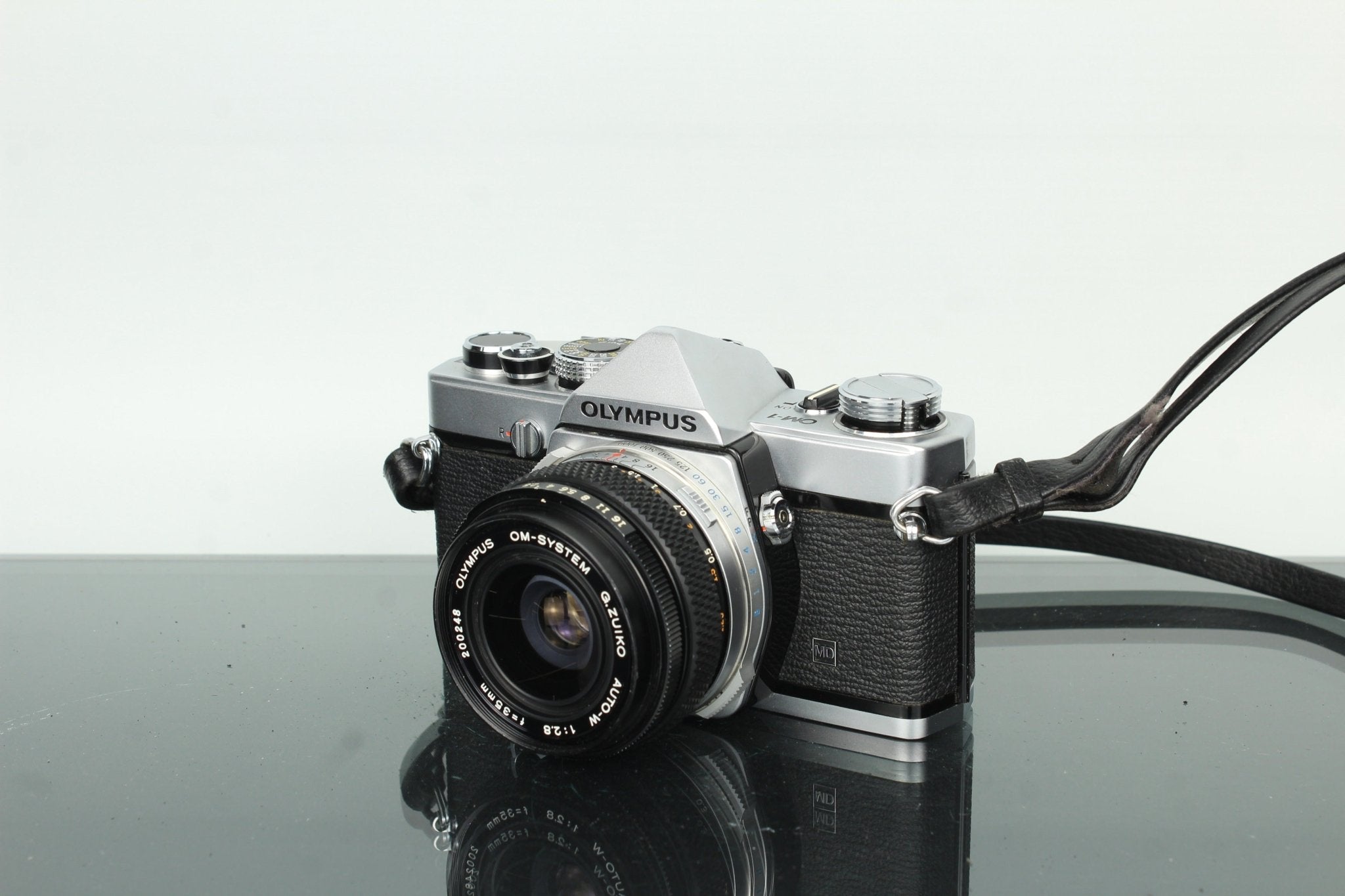 Olympus OM-1 SLR Film Camera with G.Zuiko 35mm f/2.8 Lens – Dutch